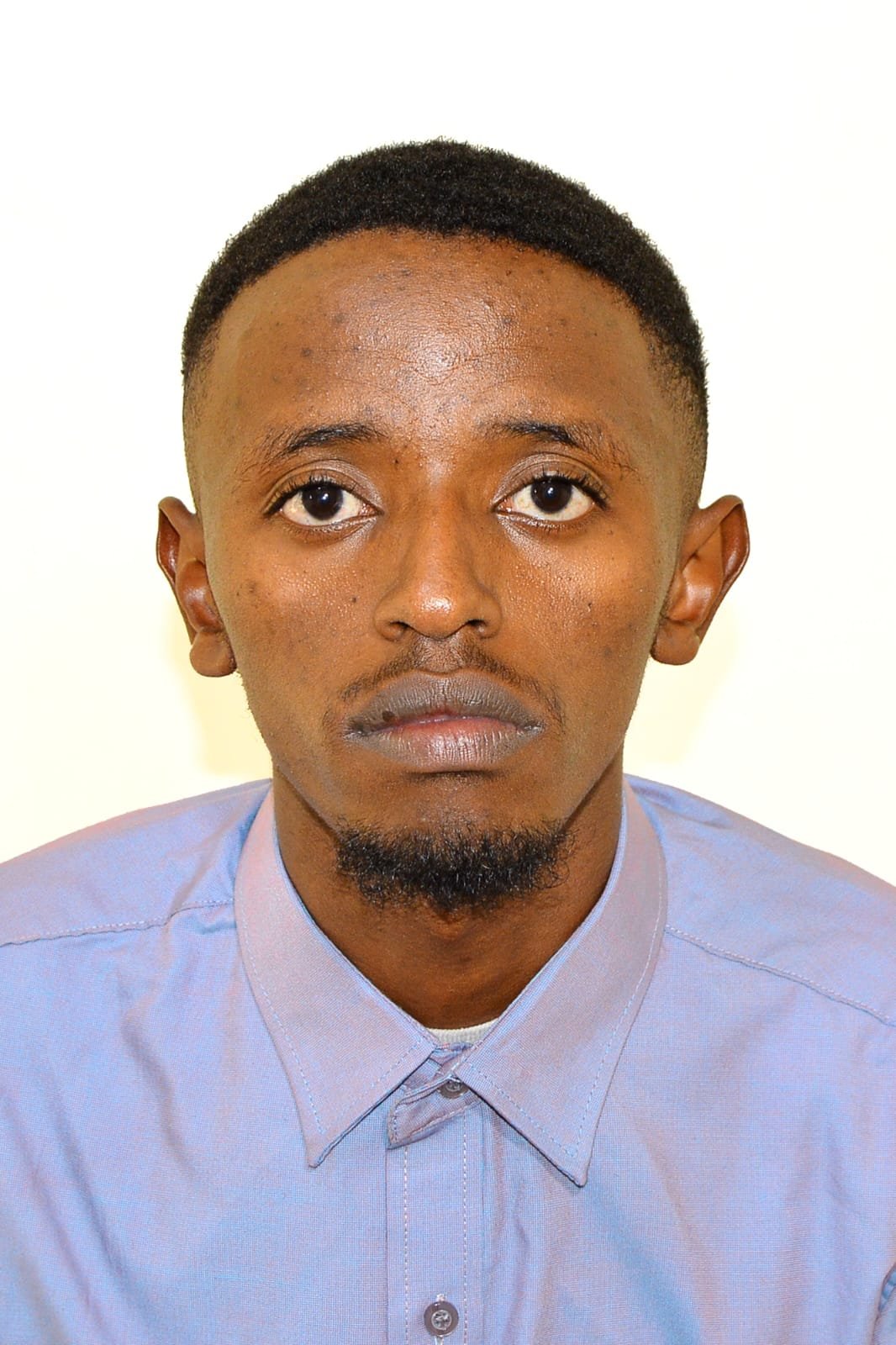 DENNIS KAMAU